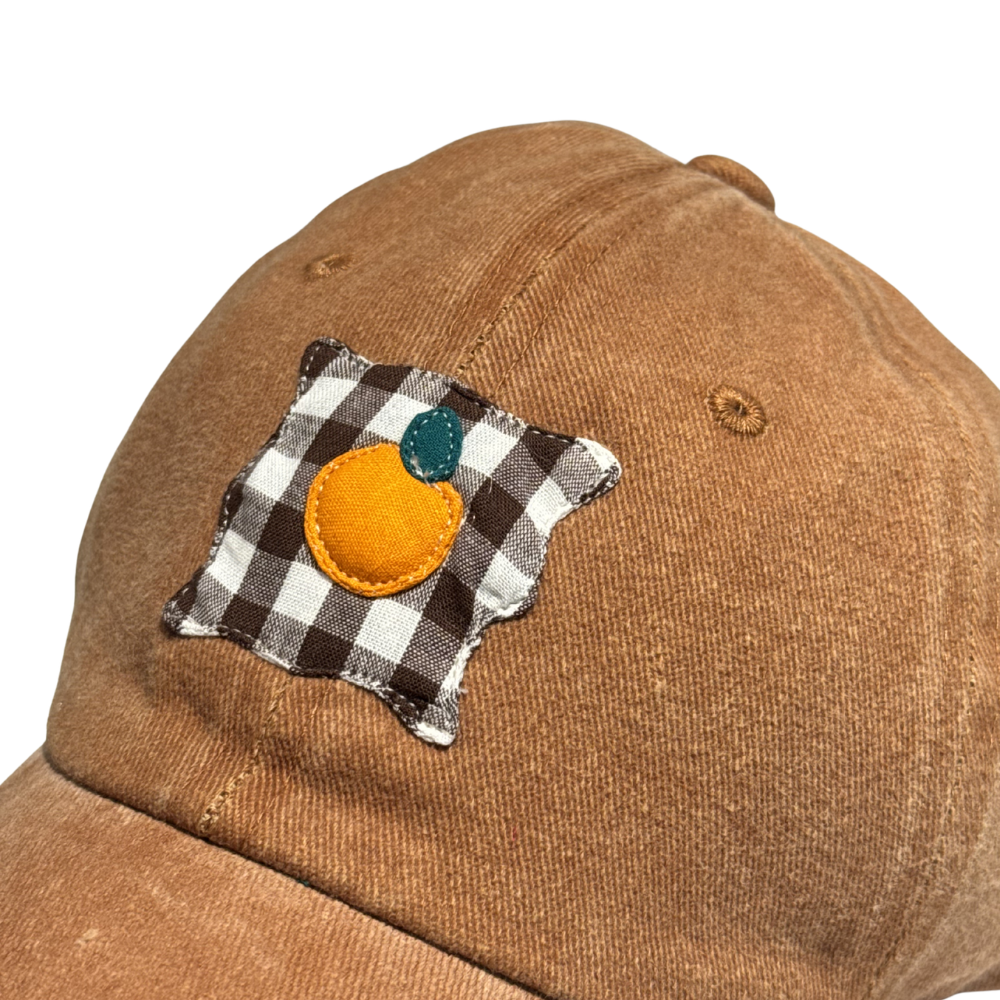 Casquette camel à motif orange