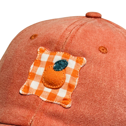 Casquette orange à motif orange
