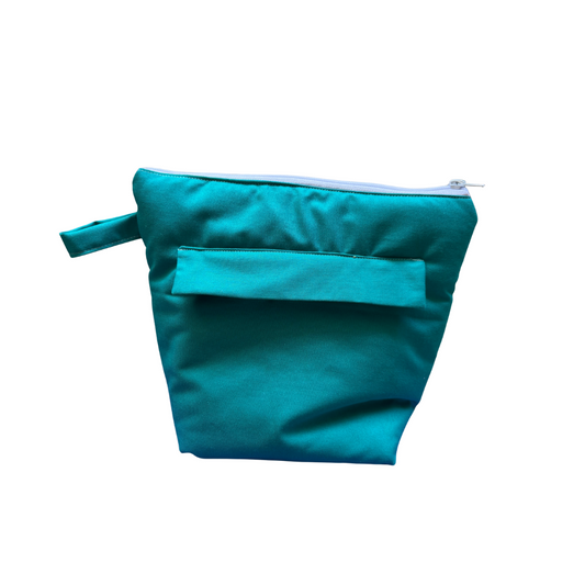 Troussass de toilette verte avec oranges