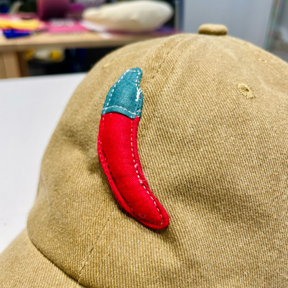 Casquette kaki motif piment