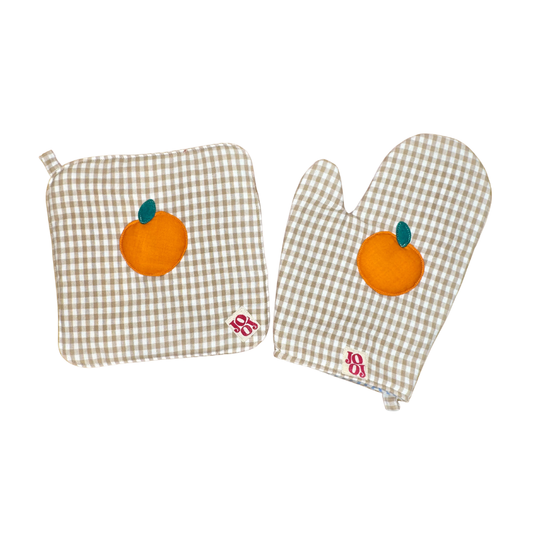 Ensemble manique + gant orange sur fond beige vichy
