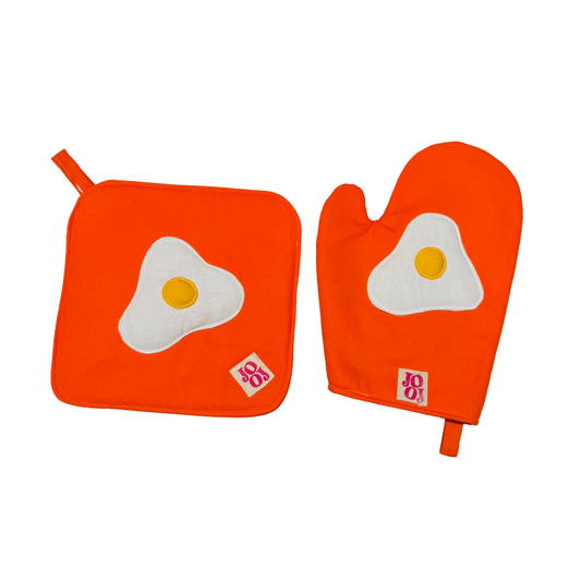 Ensemble manique + gant œuf au plat sur fond orange