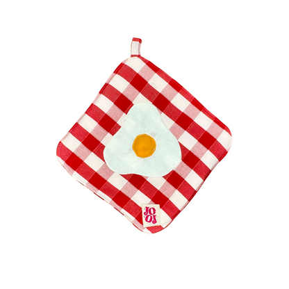 Ensemble manique + gant œuf au plat sur fond vichy rouge