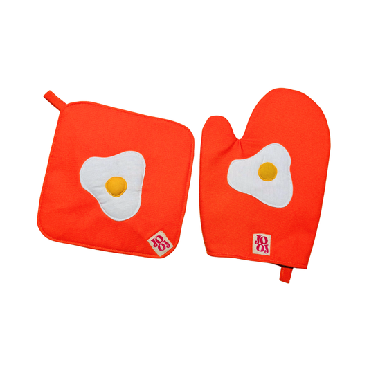Ensemble manique + gant œuf au plat sur fond orange