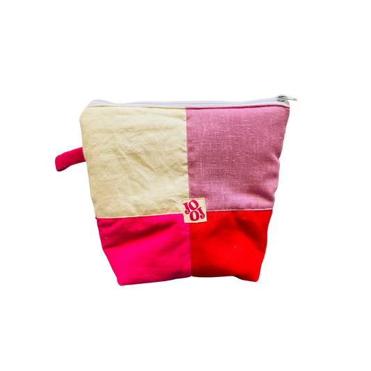 Troussass de toilettes écru, lila, vert, rouge et rose