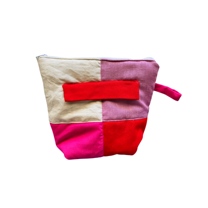 Troussass de toilettes écru, lila, vert, rouge et rose