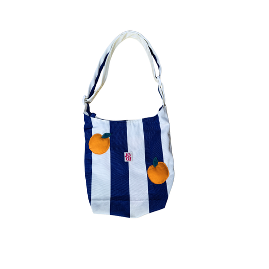 Boursass rayée bleu et blanc à motifs oranges
