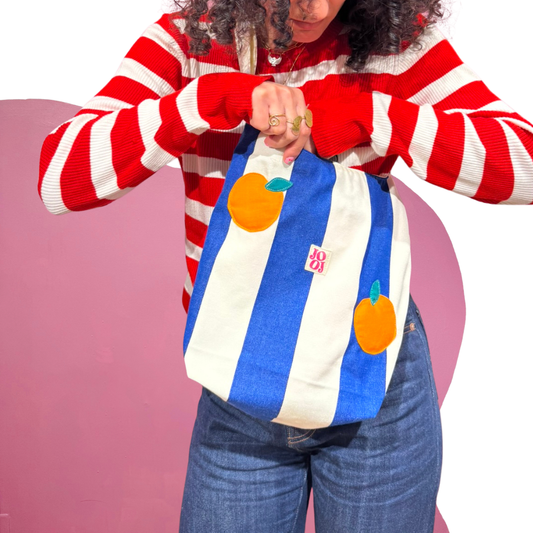 Boursass rayée bleu et blanc à motifs oranges