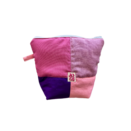 Troussass de toilettes rose, lila, mauve et rose clair