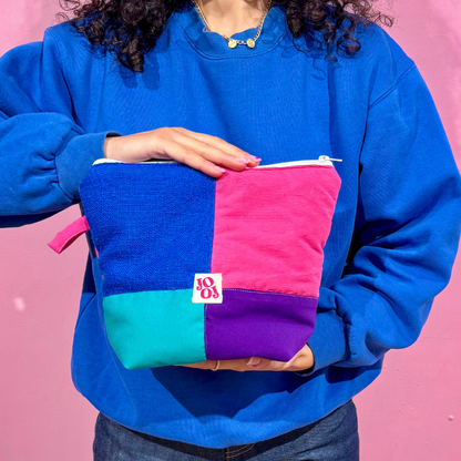 Troussass de toilettes bleu, rose, vert et violet