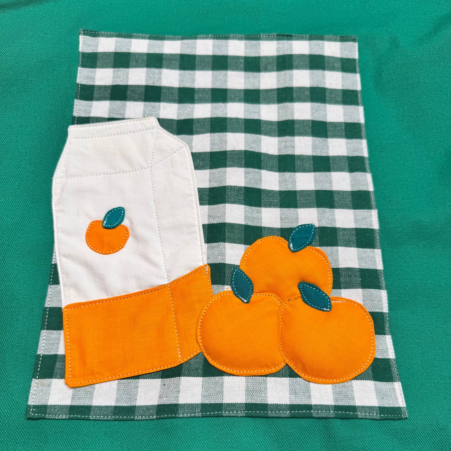 Veste verte à motif vichy vert et jus d’oranges 3D