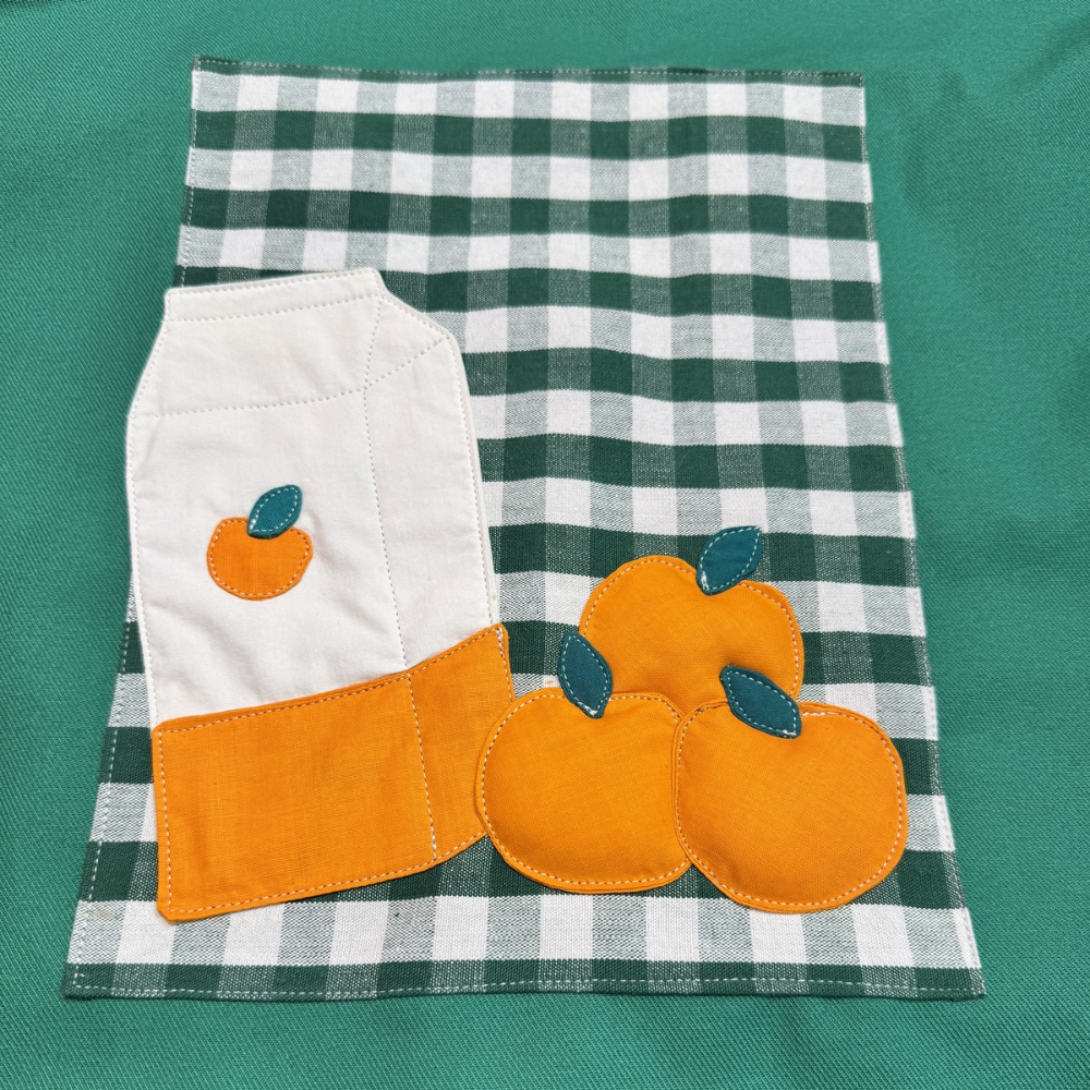 Veste verte à motif vichy vert et jus d’oranges 3D
