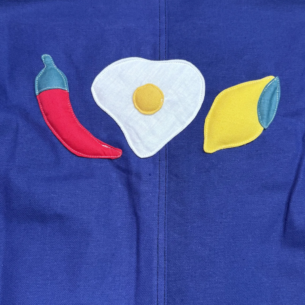 Veste bleue marine à motif piment œuf et citron